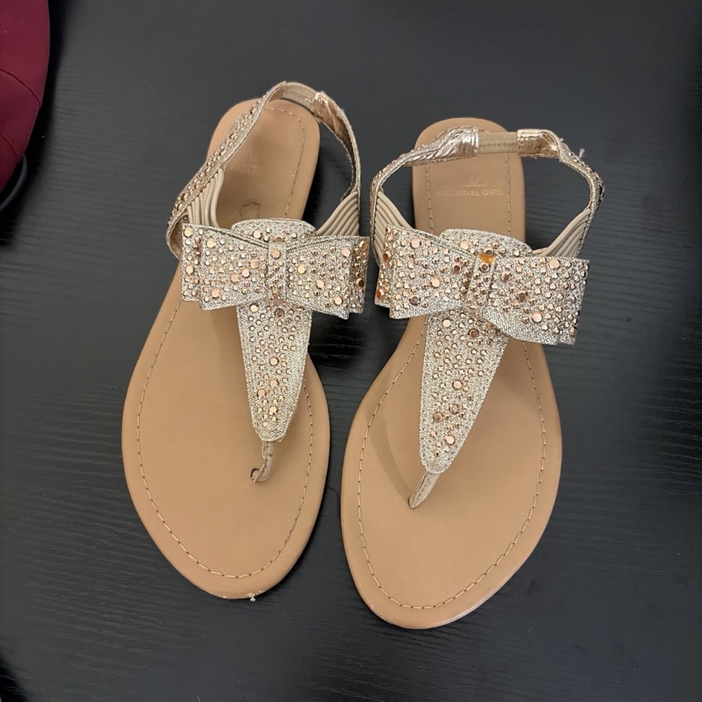 Material Girl Glittering Gold Sandals with Bow
